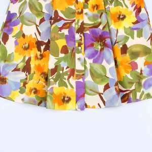 Robe midi boutonnée à imprimé floral jaune et violet avec détails de boutons