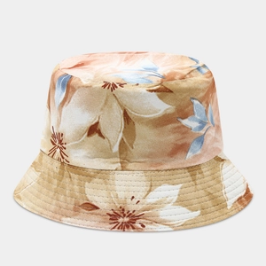 Detailed view of floral pattern bucket hat with reinforced brim stitching and fabric texture