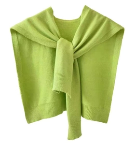 Fruit green knitted shawl wrap with cross knot design on a clean white background