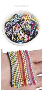 Macro shot of colorful 12cm metal ball chains with matching connectors in various colors