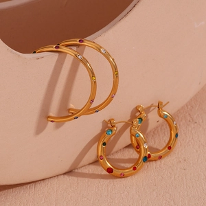Detail of 18K gold plated lava square earrings featuring multi-colored zircon stones