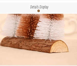 Detail of sisal miniature Christmas trees on natural wood bases for table decor