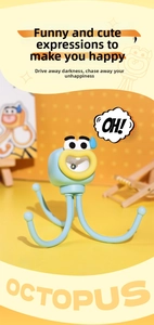 Blue cartoon octopus LED night light with flexible legs and funny facial expression