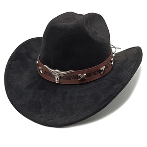 Detail of black suede cowboy hat with brown leather band and silver bull head studs