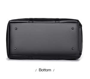 Litchi texture leather travel bag bottom view with four protective metal studs