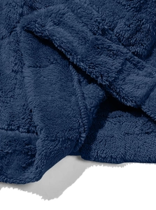 Close-up of premium thick navy blue fleece fabric with a soft and fluffy texture