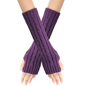 Detail of purple cable-knit fingerless gloves showing long sleeve texture and pattern