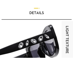 Close-up of elegant black sunglasses featuring five different crystal rhinestones on the temple