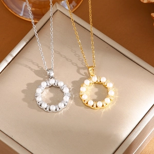 Minimalist titanium steel necklace with circular faux pearl pendant in gold and silver