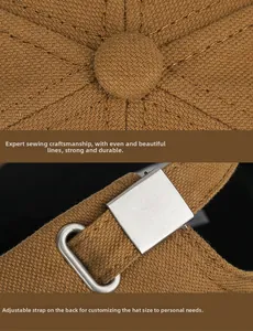 Close-up of brown baseball cap showing top button stitching and adjustable metal back strap