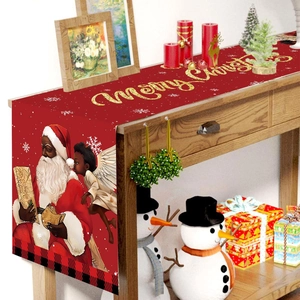 Christmas table runner with Black Santa and angel pattern on red wood table decor