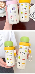 Detail of cartoon farm animal illustration on portable stainless steel insulated water bottle