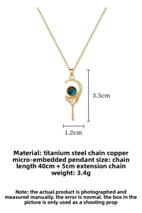 Macro shot of titanium steel moon pendant with blue stone and sparkling crystal details