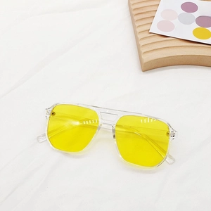 Detail of square pilot sunglasses with transparent yellow lenses and double bridge frame