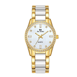 Detail of crystal-encrusted bezel and mother-of-pearl dial on a ceramic women's watch
