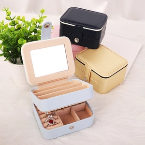 Multiple colors of PU leather jewelry boxes with interior mirror and ring slots