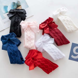Princess style baby high socks with double bows and cable knit patterns in seven colors