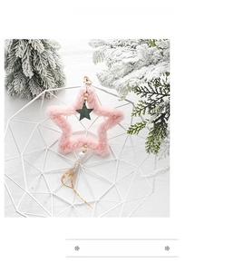 Pink plush star ornament with wooden beads and feather detail for Christmas tree decor