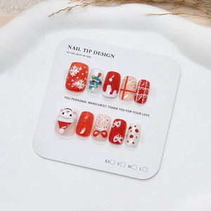 Christmas snowman press-on nails with red bow and snowflake patterns in short square shape