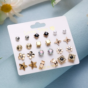 12-pair stud earring set with gold, silver and crystal stars, flowers and hearts on display card