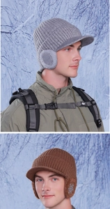 Close-up of winter knit baseball cap with earflaps and soft faux fur lining for warmth