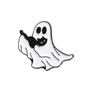 Close-up of Halloween enamel pin featuring a white ghost hugging a black cat