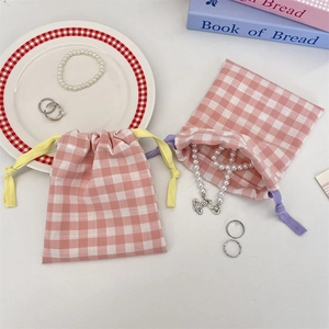 Pink checkered cotton drawstring storage bag set for jewelry and cosmetic organization