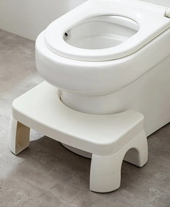 U-shaped thickened plastic toilet stool with non-slip base on grey tile floor