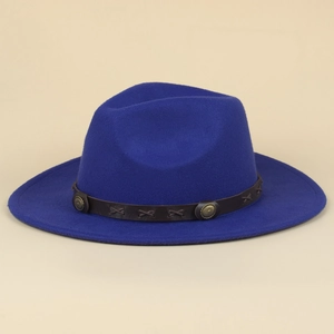 Detail of royal blue wool fedora featuring leather band with studs and cross stitching