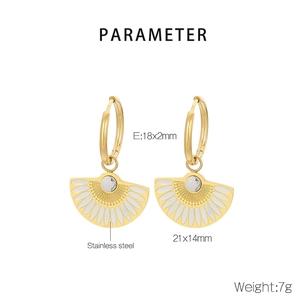 Detail shot of 18k gold plated fan earrings with white enamel inlay and product dimensions