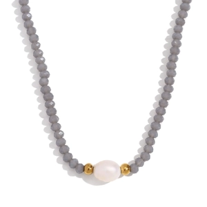 Faceted gray bead necklace with center white freshwater pearl and gold accents