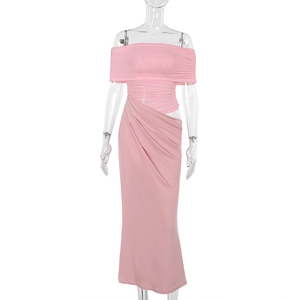 Detail of pink off-shoulder dress featuring ruched fabric and waist cutout design
