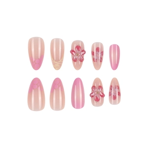 Pink short almond press on nails with 3D floral relief and gold bead embellishments