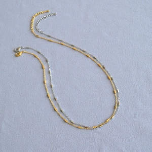 Minimalist gold and silver bamboo chain necklaces with sleek metallic bars and lobster clasp