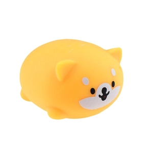 Detailed view of a yellow round Shiba Inu squishy toy made of soft TPR material