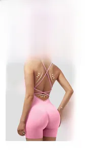 Close-up of pink ribbed yoga jumpsuit highlighting lifting and shaping properties