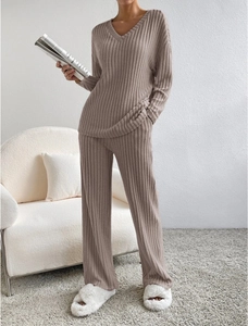 Detail shot of the V-neck knit loungewear set showing the ribbed texture fabric and loose fit