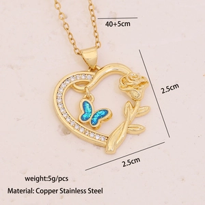 Detail view of heart pendant with 3D rose and blue butterfly on a gold chain