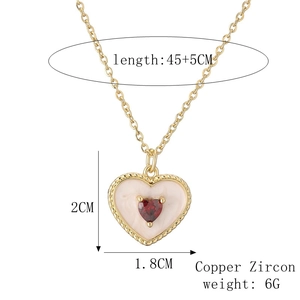 Detailed view of gold plated heart pendant necklace with size specs and materials