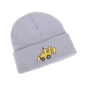 Detail of grey knitted winter hat featuring a yellow excavator embroidery for boys