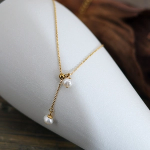 French style adjustable gold-plated Y-necklace with natural freshwater pearls and tassels