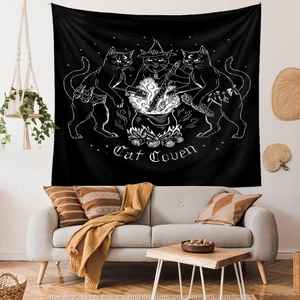 Detailed view of Cat Coven black cat tapestry used as a decorative wall hanging in a living room