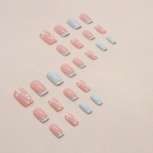 Medium square press-on nails with light pink and blue colors featuring hand-painted flowers