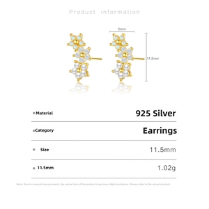 Detailed view of S925 silver flower earrings with white pearls and sparkling diamonds
