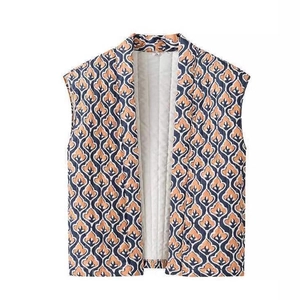 Vintage navy and orange abstract leaf print padded vest with white quilted lining