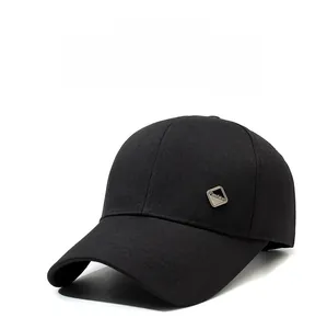 Close-up of black baseball cap with premium twill cotton fabric and diamond metal logo