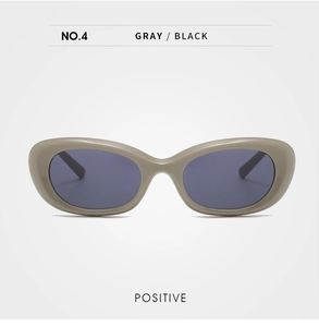Front view of oval gray acetate sunglasses with black lenses in a minimalist style
