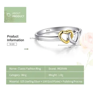 Minimalist s925 sterling silver interlocking heart ring with two-tone silver and gold finish