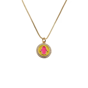 Gold chain necklace with a pink and yellow enamel Hamsa hand pendant and zircons