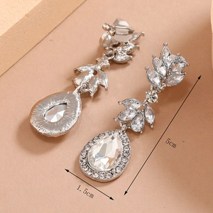 Detail view of 5cm silver long leaf-shaped bridal earrings with marquise rhinestones